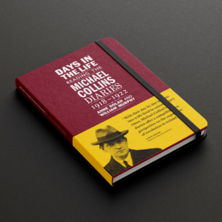 Days in the Life: Reading the Michael Collins Diaries 1918–1922 cover. The cover is a wine leatherette with a white foil block for the title, it has a closure elastic thread band and a yellow belly band featuring a portrait of Collins.