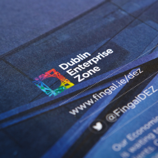 Closeup of the Dublin Enterprise Zone logo printed on a brochure.