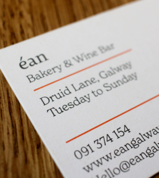 Detail of Éan card featuring address and contact details.