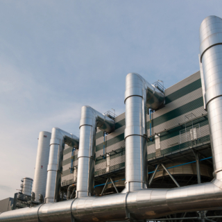 Pipes used for district heating on the outside of a building.