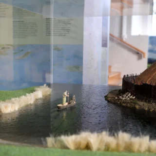 Detailed model of a crannóg, an ancient Irish lake dwelling, displayed at Nobber Heritage Centre