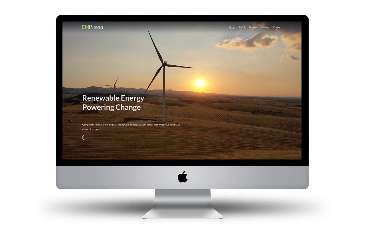 Image of the homepage of the EM Power website. This shows an image of a wind farm with the sun setting behind it.